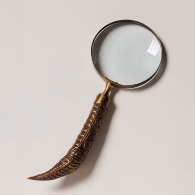 Loupe Etnik gravée dorée résine 28x10cm