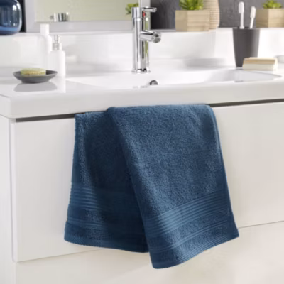 Serviette de toilette 50 x 90 cm eponge unie tendresse Saphir